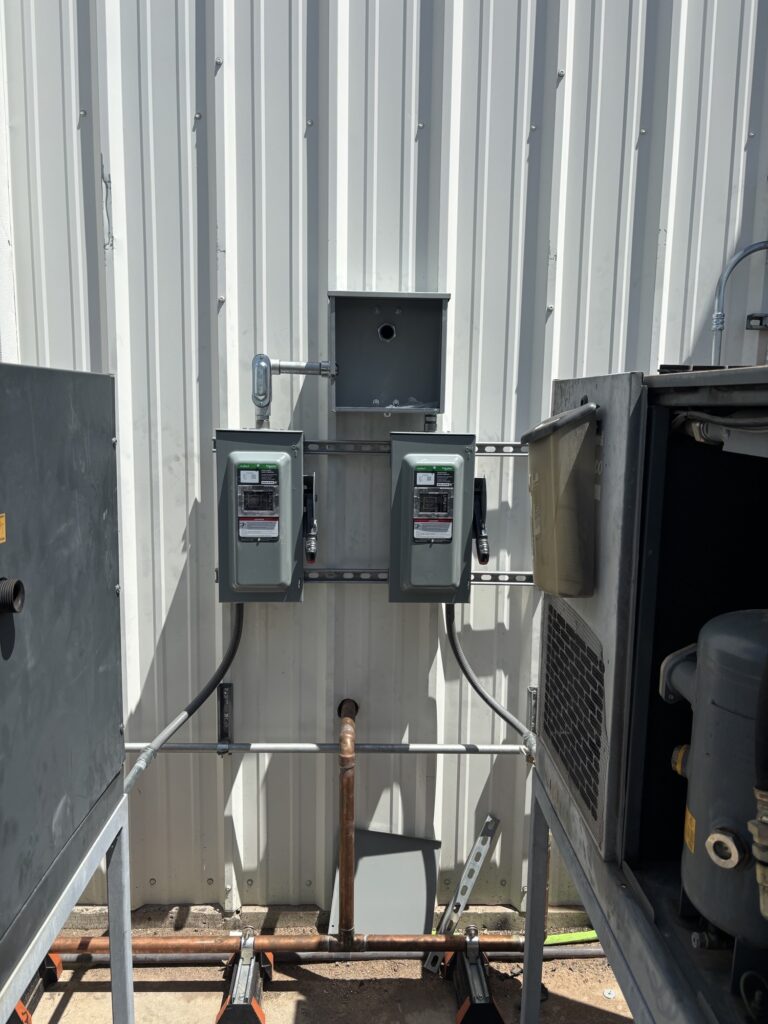 Commercial service disconnects on a metal building in the West Valley, AZ